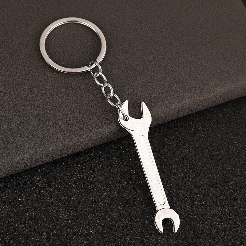 พวงกุญแจผู้ชายแบบพกพา Mini Utility กระเป๋ากระเป๋ารถกุญแจแหวน Clasp ไม้บรรทัดค้อนประแจกรรไกรขวานเลื่อย Vernier