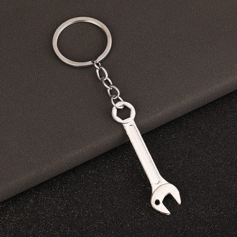 พวงกุญแจผู้ชายแบบพกพา Mini Utility กระเป๋ากระเป๋ารถกุญแจแหวน Clasp ไม้บรรทัดค้อนประแจกรรไกรขวานเลื่อย Vernier