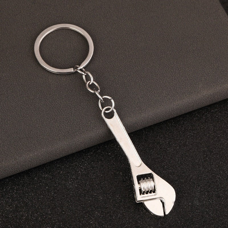 พวงกุญแจผู้ชายแบบพกพา Mini Utility กระเป๋ากระเป๋ารถกุญแจแหวน Clasp ไม้บรรทัดค้อนประแจกรรไกรขวานเลื่อย Vernier